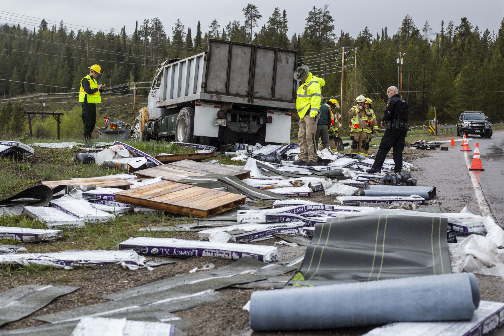 Dump truck rolls over in Wilson